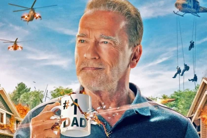 a man holding a mug with a text on it